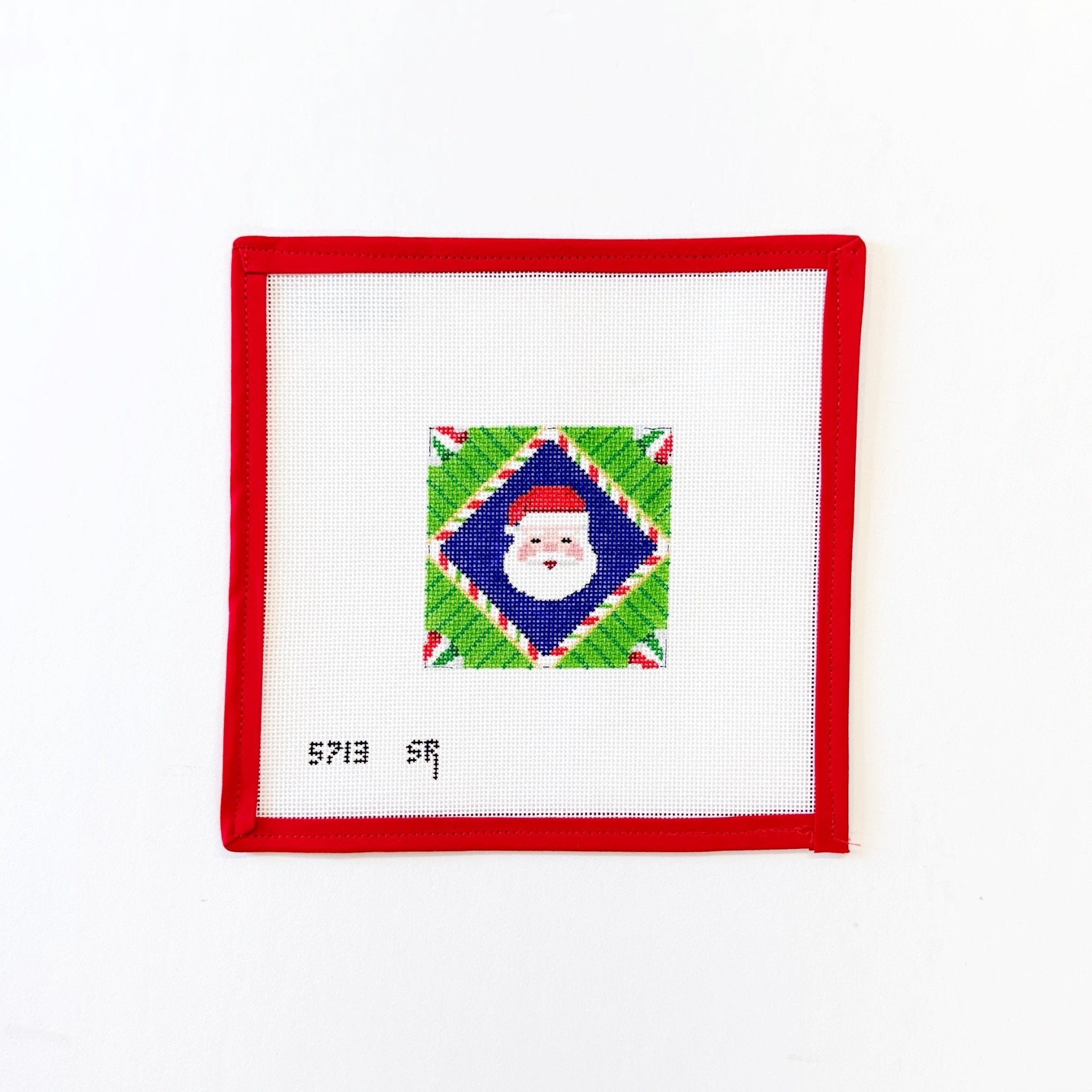 Santa Face OrnamentSusan RobertsCanvasThe Red Thread Atelier