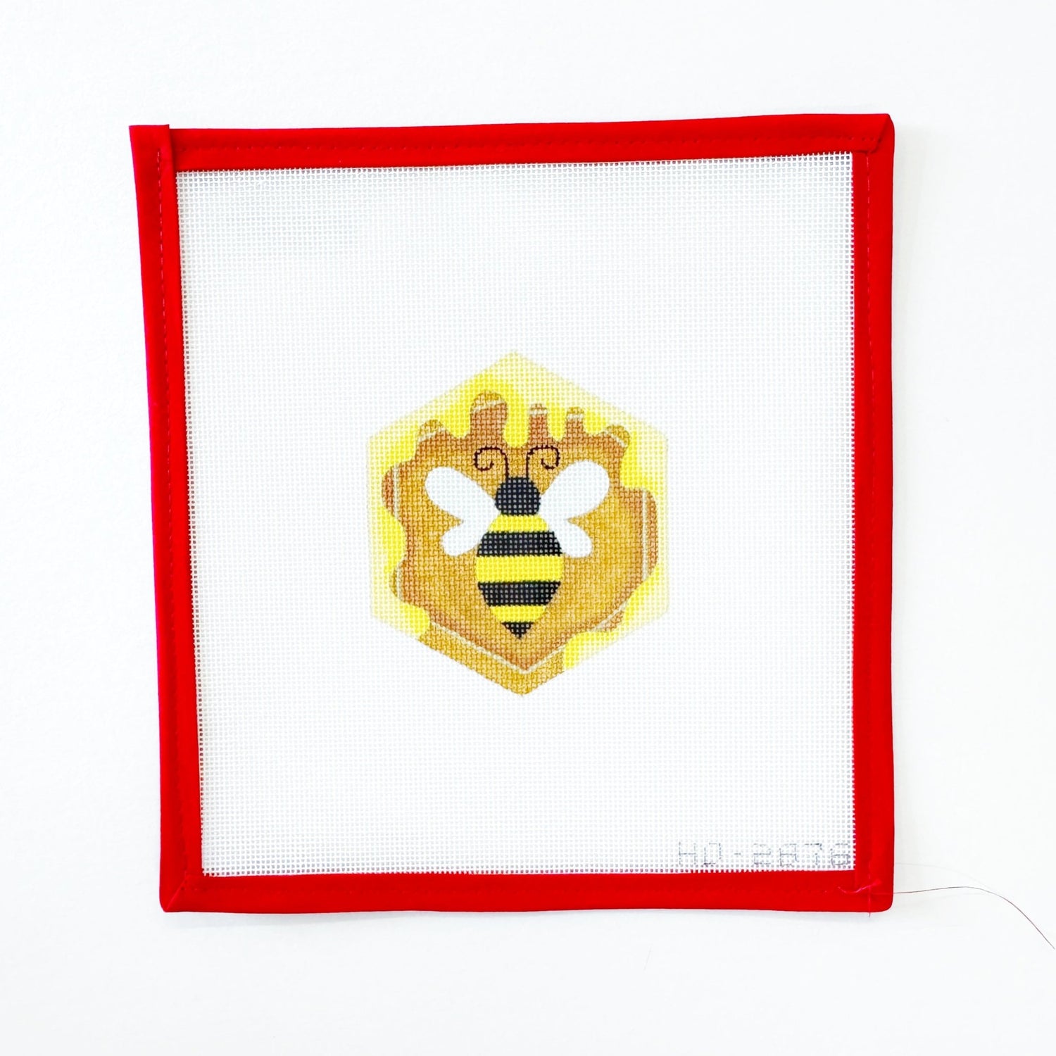 Honeycomb Bee OrnamentRaymond CrawfordCanvasThe Red Thread Atelier