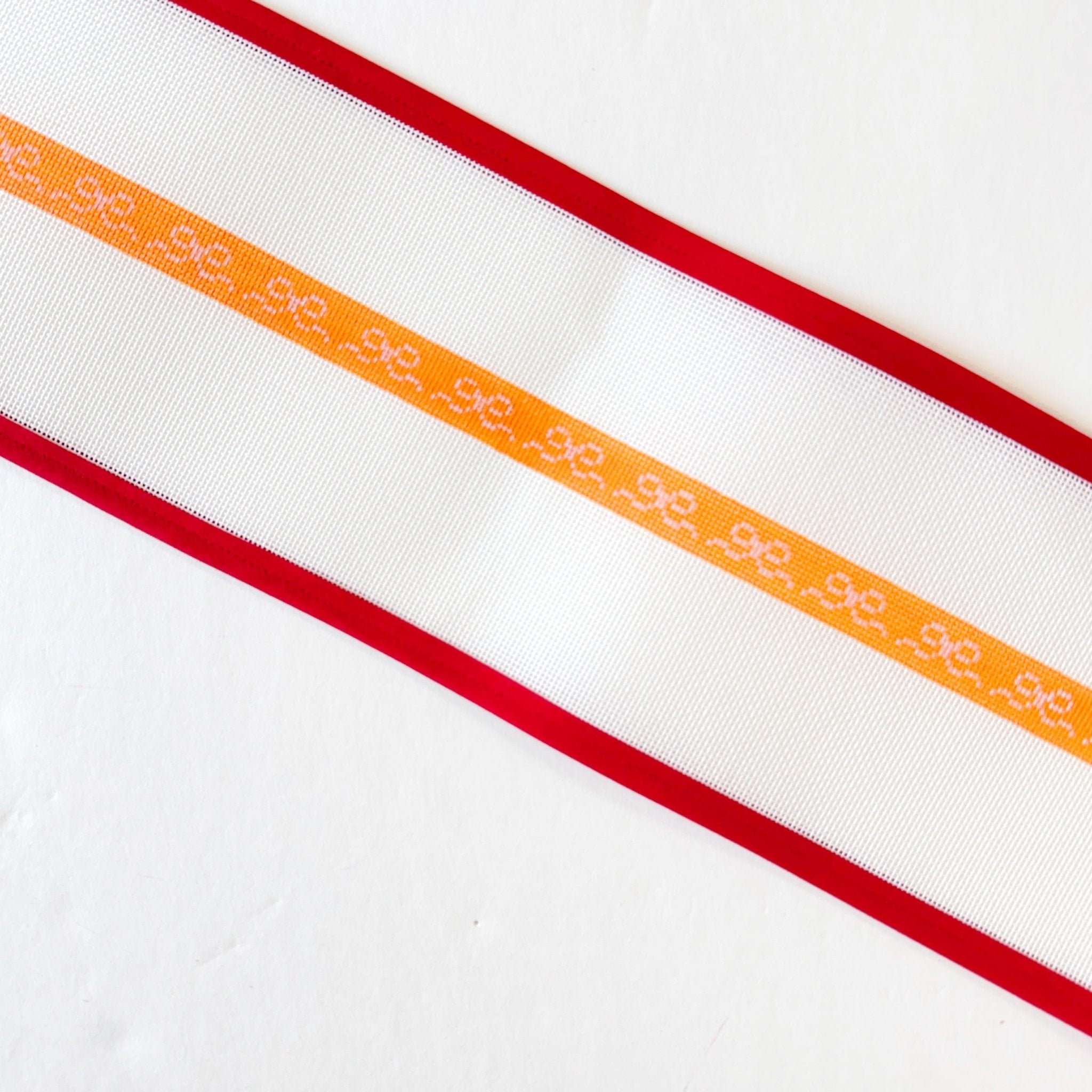Orange w Pink Bow Wrap BraceletAnne Fisher NeedlepointCanvasThe Red Thread Atelier