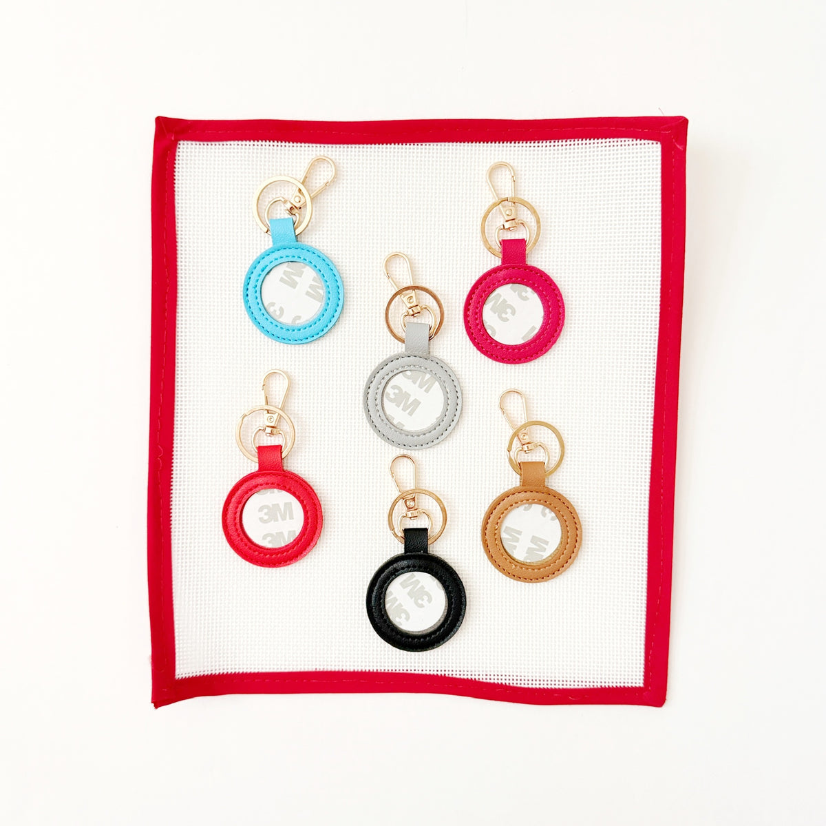 Leather Key FobsPlanet Earth FiberThe Red Thread Atelier