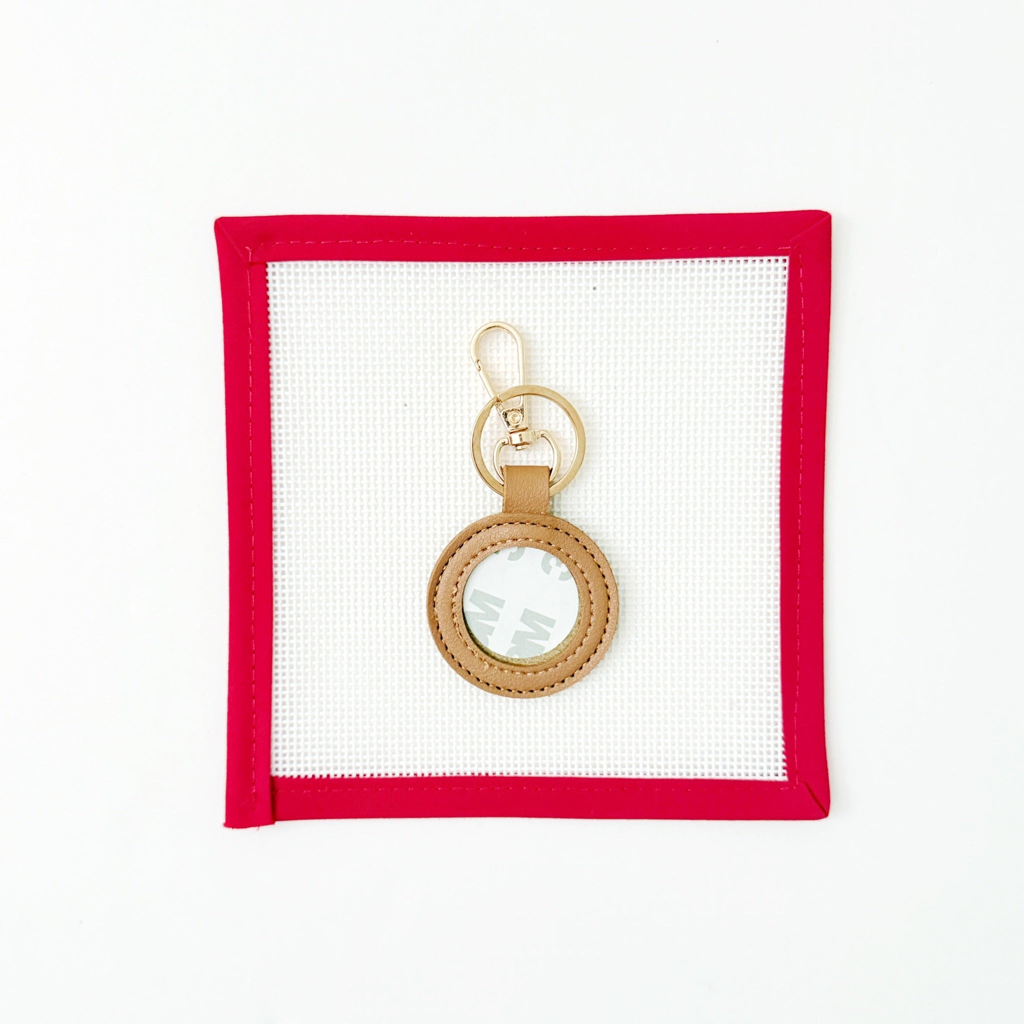 Leather Key FobsPlanet Earth FiberThe Red Thread Atelier