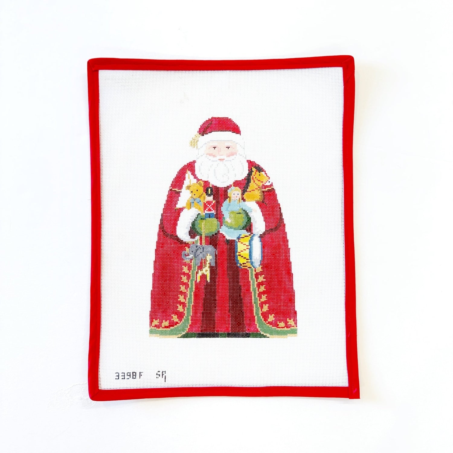 Santa with Toys Tree TopperSusan RobertsCanvasThe Red Thread Atelier